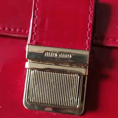Miu Miu clutch red new with gold detailing