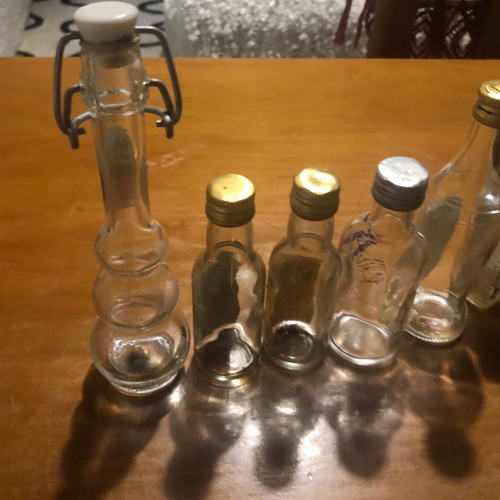 Glass miniature bottles used, pack of 7, vintage spirit collection