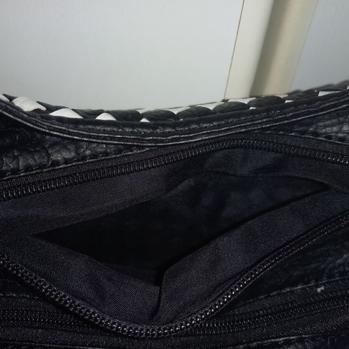 Black and white chic shoulder bag with flower detail