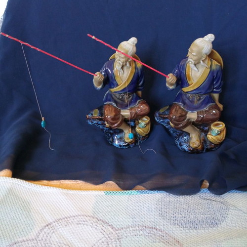 Decorative porcelain figurines used, two Chinese fishermen