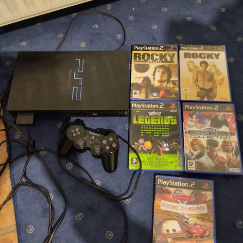 PlayStation 2 used with games, controller and memory
