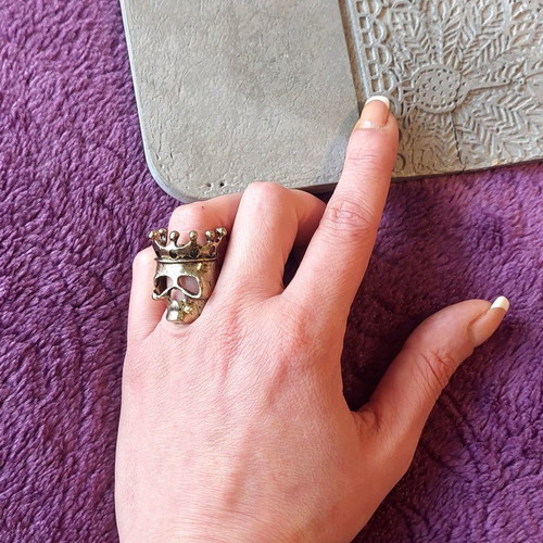 Bronze skull ring with crown, rock style