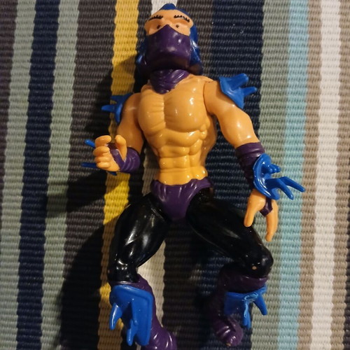 Shredder action figure used with missing parts