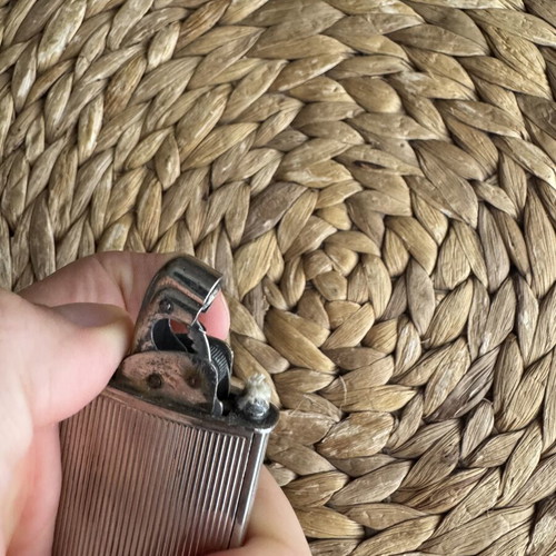 Evans Vintage lighter used with wear