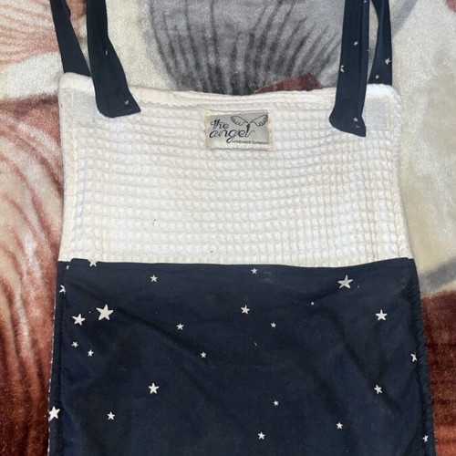 The Angel fabric organizer for baby crib or changing table like new