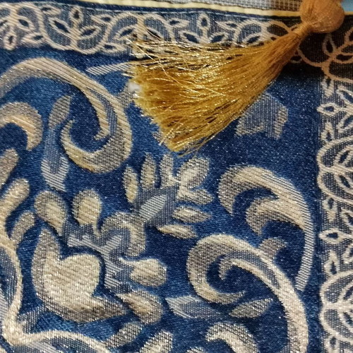 Large blue and gold tablecloth with tassels like new