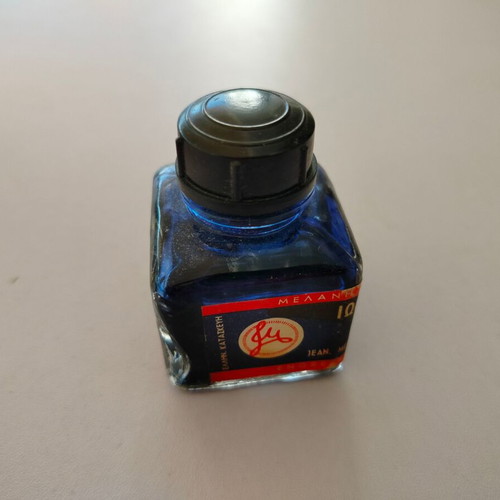 Menounos ink in glass bottle used, 60s-70s era