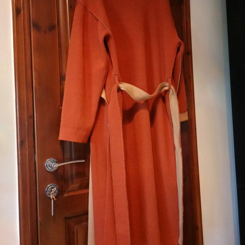 The Knls coat new, tan-cinnamon color, one size, soft without buttons