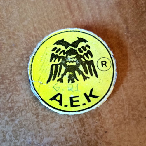Collectible old AEK pin badge from the 80s used
