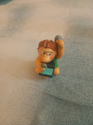 Kinder prehistoric man figure used