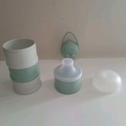 Suavinex baby milk dispenser and pacifier case used