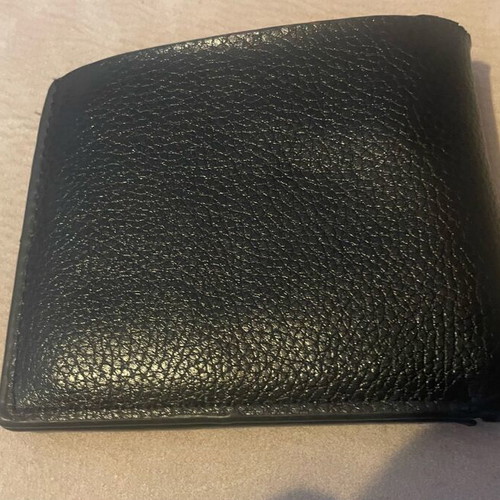 Leather wallet used with many compartments and slim design