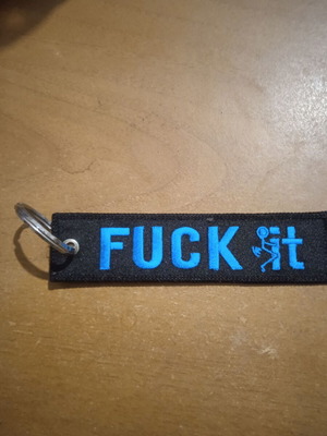 Embroidered fabric keychain like new with Fuck it text