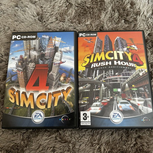 Sim City 4 and Sim City Rush Hour 4 PC games like new, complete with manual