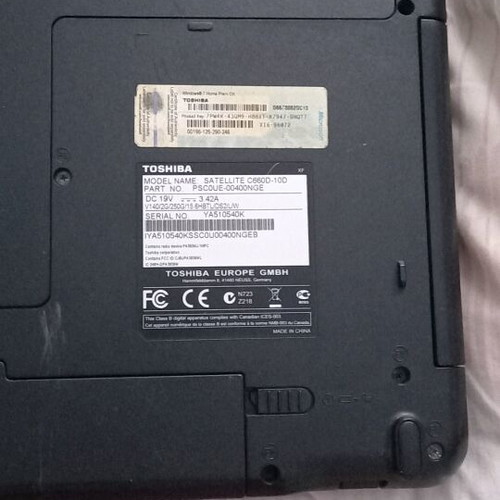 Toshiba Satellite C660D-10D laptop used with charger and accessories