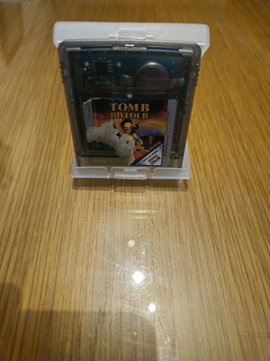 Tomb Raider game cartridge for Game Boy Color used with case