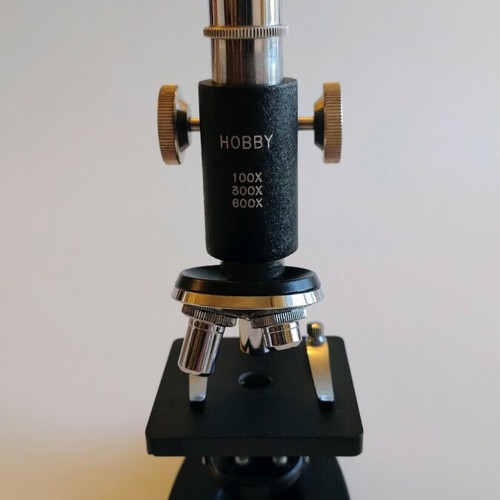 Hobby educational microscope used with 3 lenses and lighting