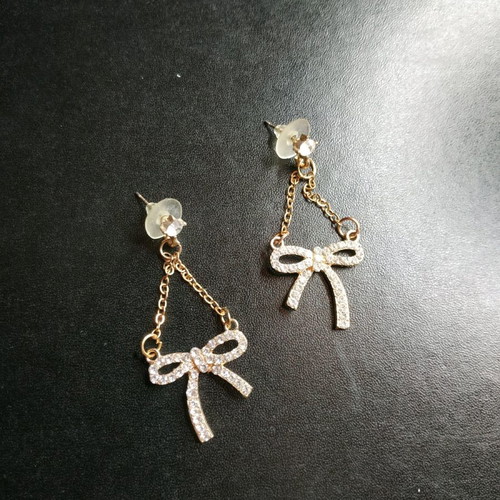 Bow earrings dangling new