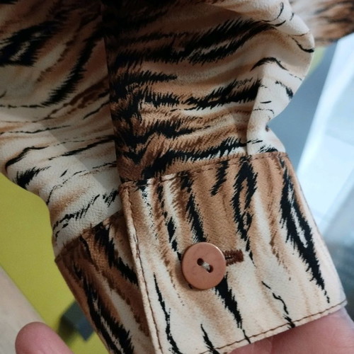 Canda women's shirt with animal print used, size 40/42
