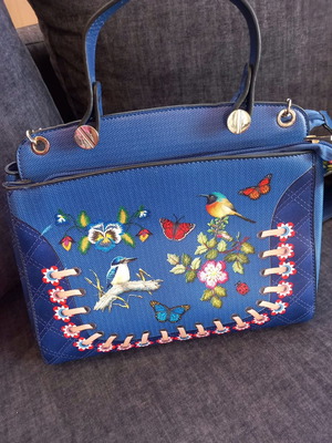 Synthetic leather bag new, hand and shoulder