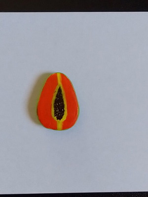 Handmade papaya magnet from clay