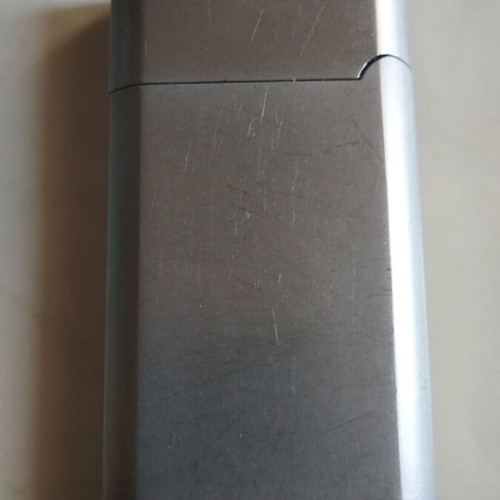 Famous Grouse lighter used, no gas