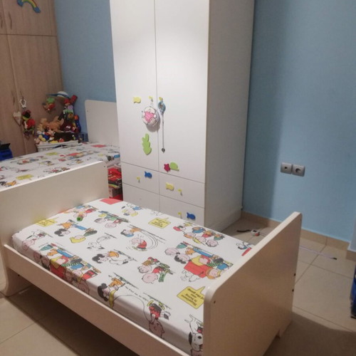 Two children's cribs convertible to beds with LaTeX mattresses