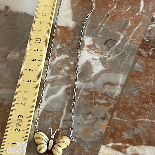 Silver butterfly necklace used vintage