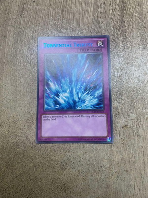 Torrential Tribute Yu-Gi-Oh! card like new with blue letters