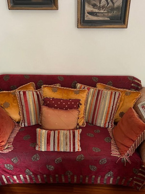 Classic three-seater sofa with fabric and leather upholstery