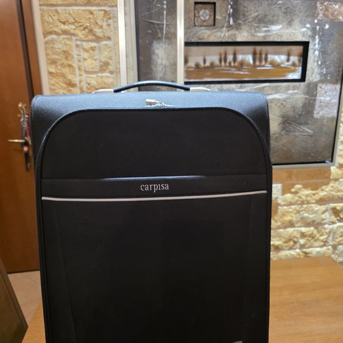 Carpisa 28" Travel Suitcase used, black semi-rigid fabric