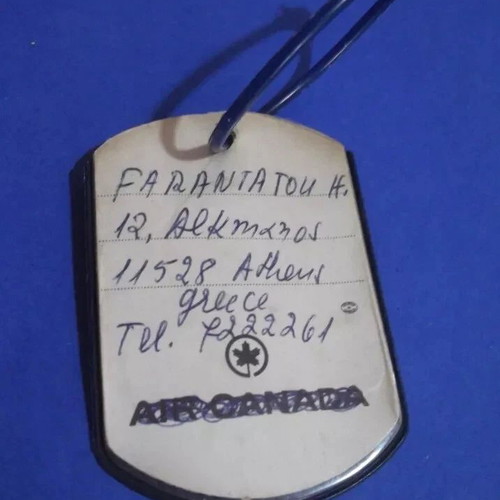 Air Canada vintage luggage tag used, dark blue with strap