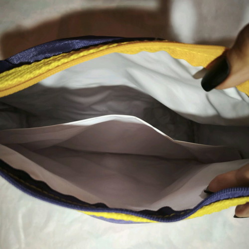 Toiletry bag used purple and yellow