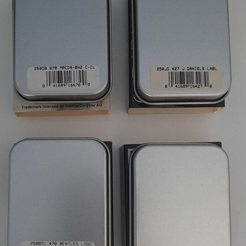 Zippo empty metal boxes like new, set of 4 with Playboy, Mercedes, The Beatles, Jack Daniel's