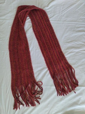 Knitted scarf like new, red multicolor with fringes