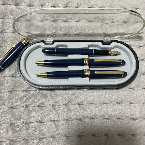 Writing set unused with pen, fountain pen and mechanical pencil in blue case