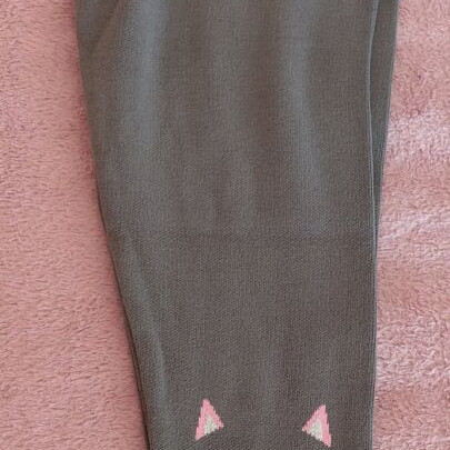 Knitted leggings used for girls age 10, charcoal with designs
