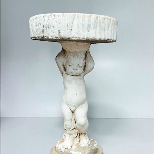 Vintage cement garden decoration with cherub angel used