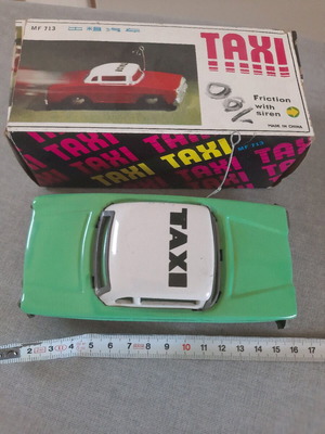 Vintage Taxi toy car like new with sound and friction