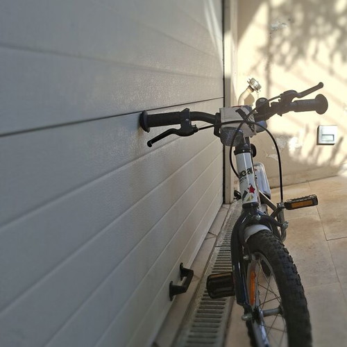 Children's bicycle used, size 14, with handlebar protectors
