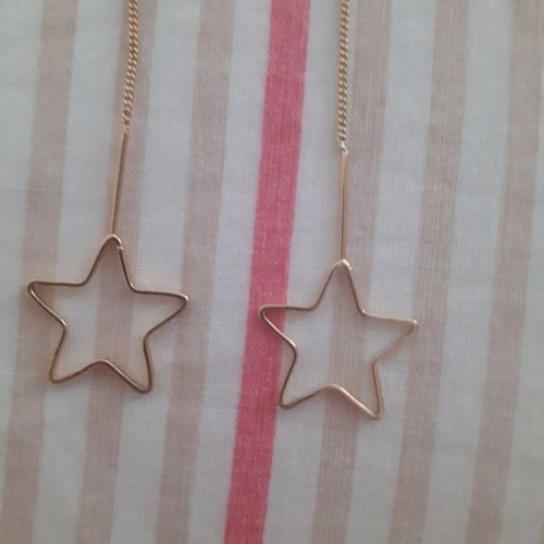 Star-shaped dangling earrings new, gold-colored