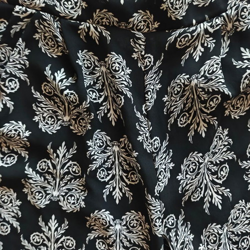 Flowy pants with black and white pattern, size S