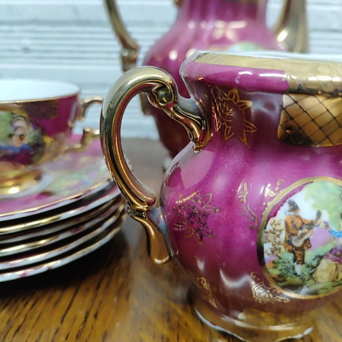Porcelain coffee set used, 15 pieces, burgundy-fuchsia with gold details