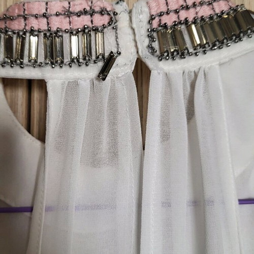 Women's top with sequins used, white with pink embroidery, size M