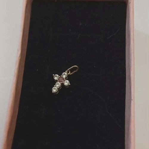Gold cross 14K used with 5 zircon stones and 1 central ruby