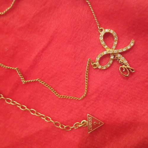 Guess necklace like new, gold color
