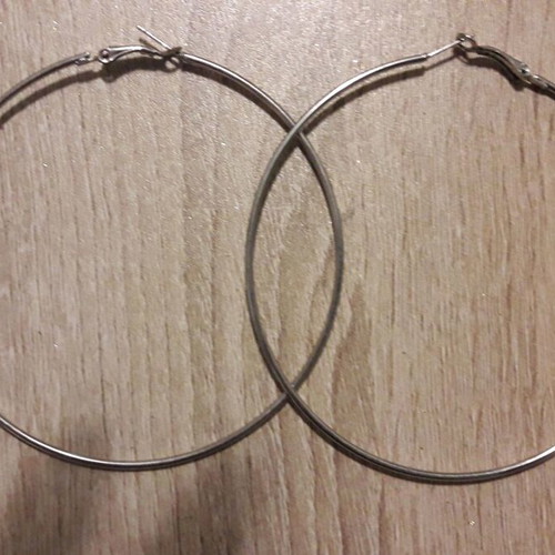 Large hoop earrings used
