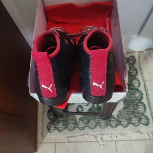 Puma men's black and red boots used with original carry bag