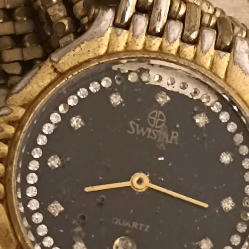 Swistar watch 18k gold plated used with visible signs of wear