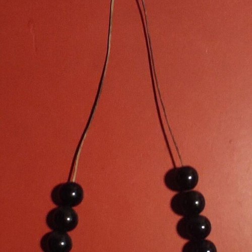Komboloi with 17 obsidian beads like new